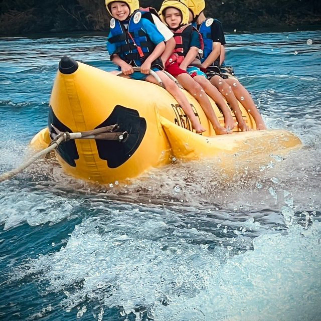 Fun on the banana inflatable ride