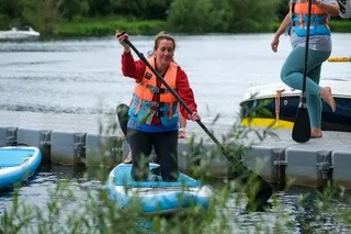 Client on paddleboard